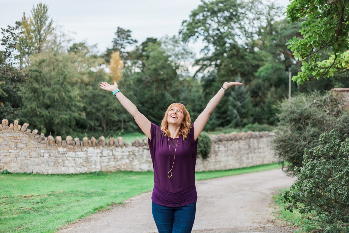 Ginny Marsh @ Gorgeous You Photography looking excited with hands in the air | Personal Branding Photo