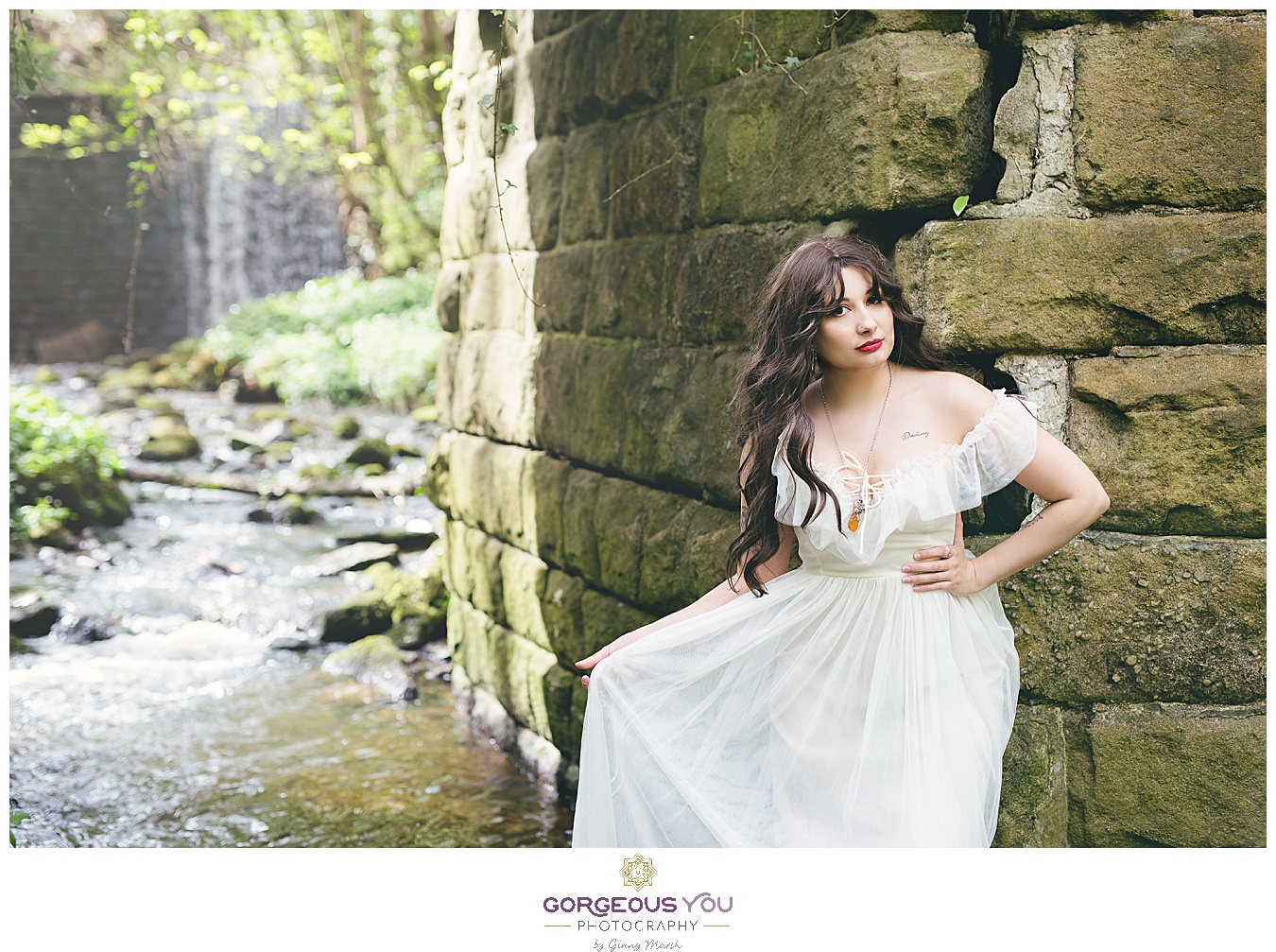 Floaty white dress leaning against a stone wall | Divine feminine goddess boudoir photoshoot | Gorgeous You Photography | North Yorkshire