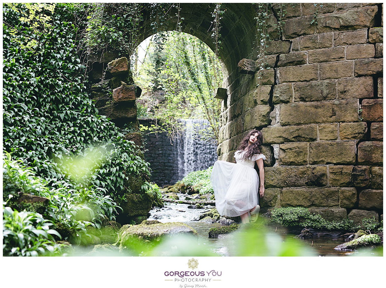 Floaty white dress under a stone archway | Divine feminine goddess boudoir photoshoot | Gorgeous You Photography | North Yorkshire