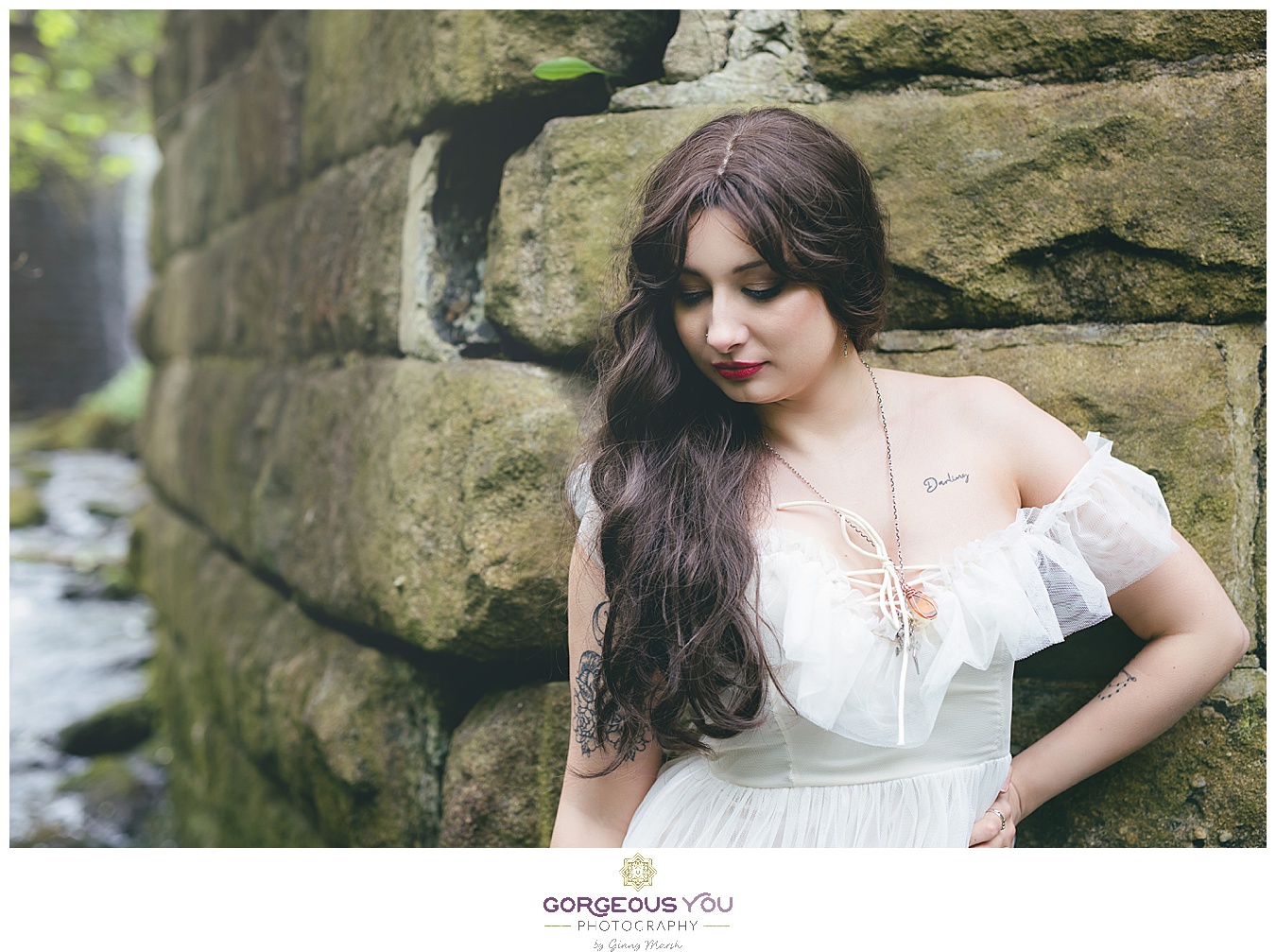 Feminine white tulle dress leaning against a stone wall | Divine feminine goddess boudoir photoshoot | Gorgeous You Photography | North Yorkshire